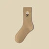 Quentin Custom Crew Embroidery Knitted Socks High Quality Low Moq Custom Good Quality Socks Own logo Embroidered Unisex Grip