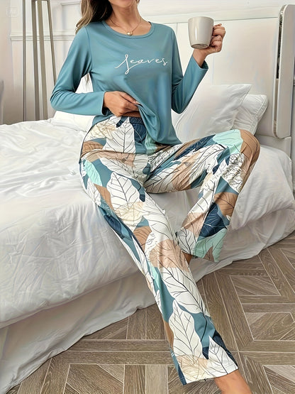 Conjunto de pijama casual, versátil e elegante para mulher com estampado de letras, blusa de manga comprida com gola redonda e calças com estampado floral para o outono e inverno.