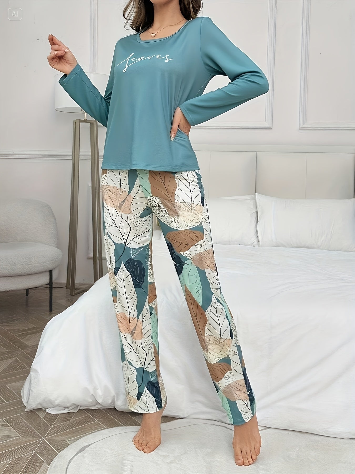 Conjunto de pijama casual, versátil e elegante para mulher com estampado de letras, blusa de manga comprida com gola redonda e calças com estampado floral para o outono e inverno.