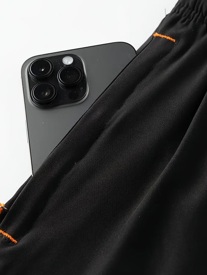 Conjunto de 4 calções desportivos para homem com riscas refletoras - Calções respiráveis ​​de secagem rápida para treinos de verão com bolsos, bege, azul marinho e preto. Calções para ténis e ginásio, design desportivo, tecido de secagem rápida.