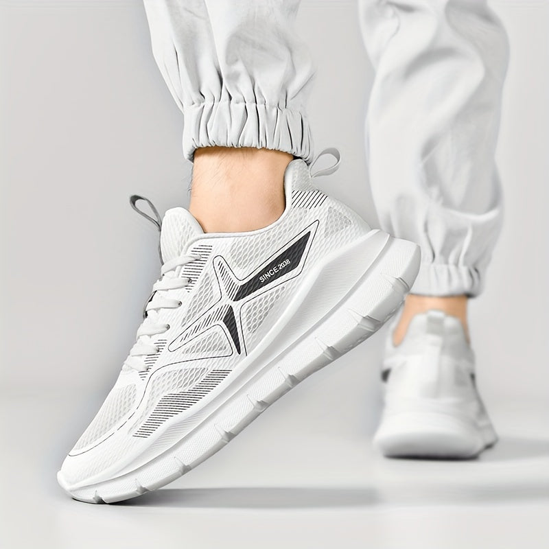 Calçado desportivo masculino casual e moderno, confortável e elegante para corrida, com características para treino cruzado, ideal para trilhos e atividades ao ar livre. Possui atacadores, cano baixo, gáspea e forro em tecido e sola em MD.