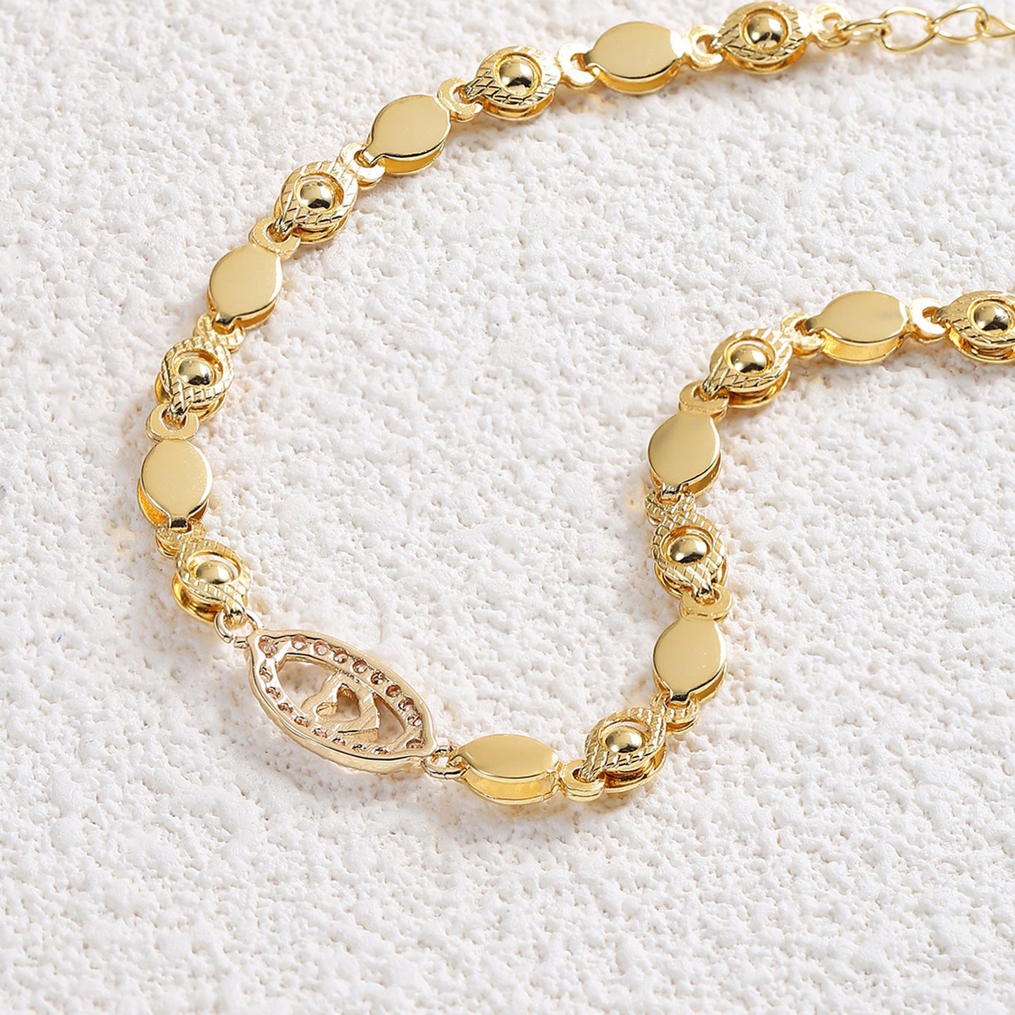 Elegant 18K Golden Plated Copper Bracelet with Synthetic Cubic Zirconia, Heart and Leaf Motif Openwork Design for Daily Wear and Special Occasions