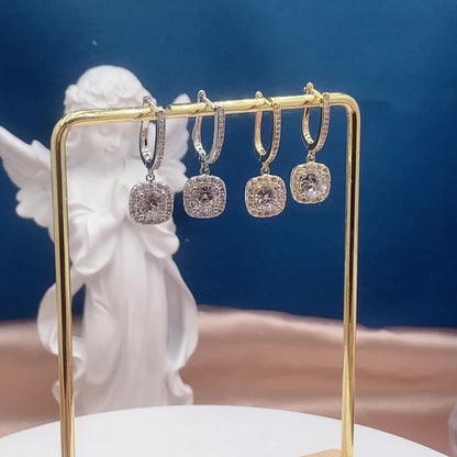 Brincos pendentes de luxo com decoração quadrada de zircónias brilhantes, banhados a ouro 14K e em cobre. Uma joia requintada para presente feminino.