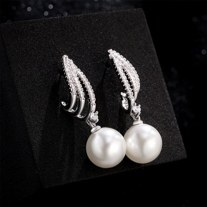 Um par de brincos pendentes para mulher em prata 925 com pérolas de água doce requintadas, acessórios de joalharia hipoalergénicos em estilo boémio, presente para mulher com caixa de oferta exclusiva.