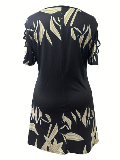 Vestido casual plus size para menina com estampado de folhas, detalhe de argola, mangas recortadas, gola redonda, corte alto e evasé frontal.