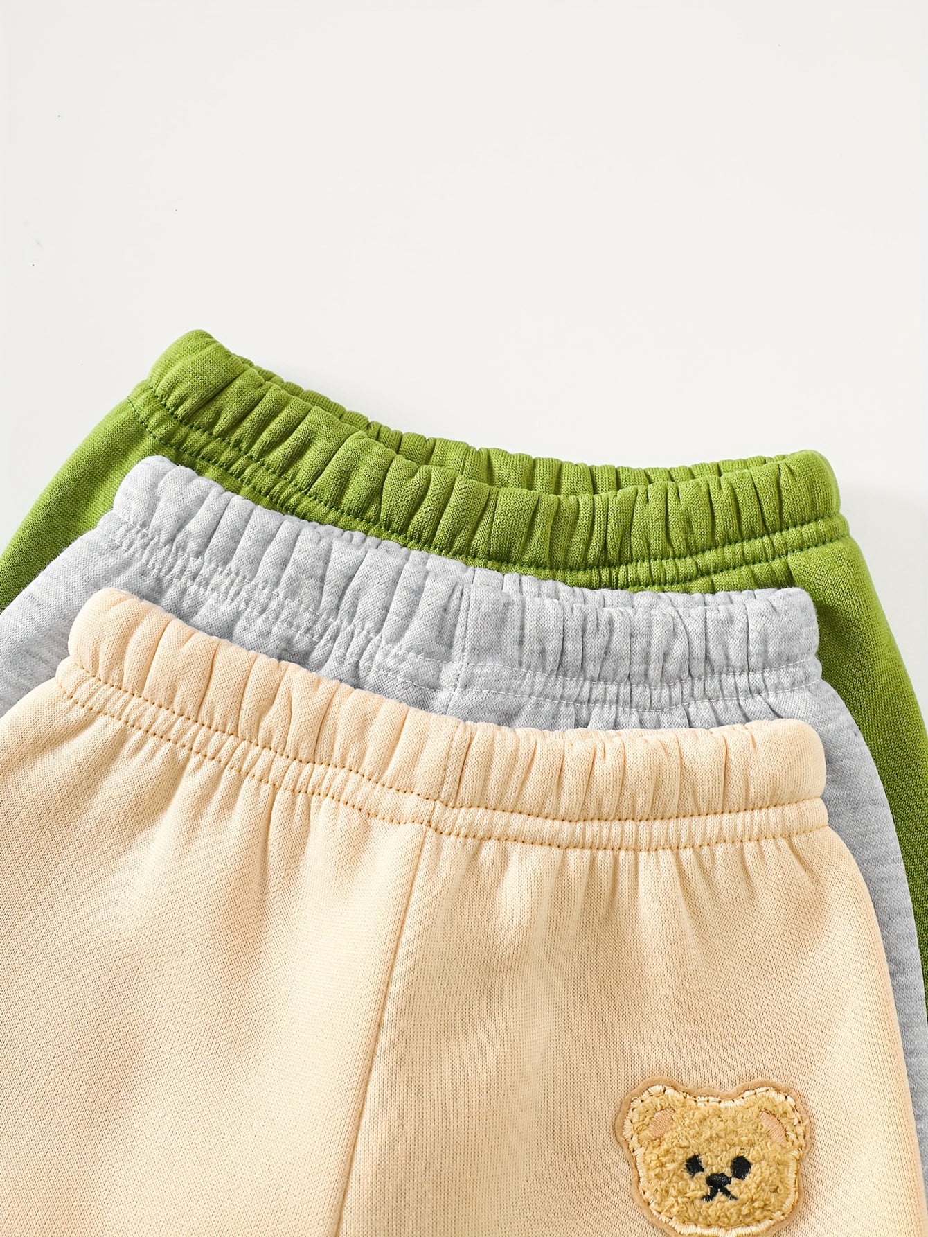 A Set of Three Fleece Hoodies for Baby Boys, Packaged in Six Pieces, Featuring a Cute Bear Patch. Perfect for Outdoor Wear During The Autumn And Winter Seasons, Making It a Great Gift for Children.