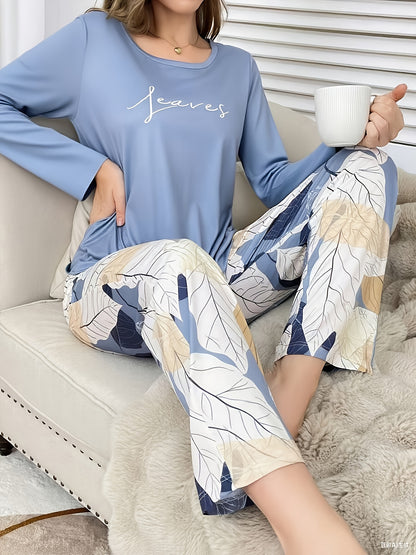 Conjunto de pijama casual, versátil e elegante para mulher com estampado de letras, blusa de manga comprida com gola redonda e calças com estampado floral para o outono e inverno.