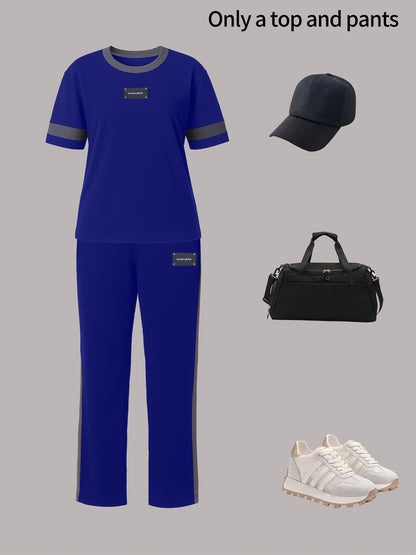 Tendência de moda outono: Conjunto de duas peças para menina composto por t-shirt de manga curta com gola redonda e blocos de cor + calças direitas casuais com cintura elástica e corte largo.