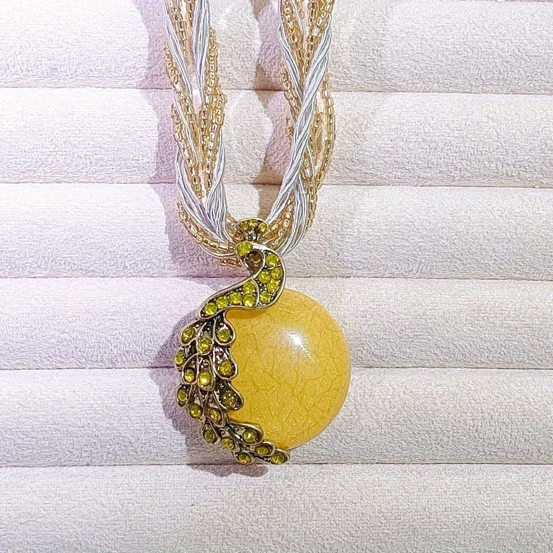 A Vintage Peacock Gemstone Necklace with a Bohemian Style, Made by Hand, Suitable for Women, Perfect for Sweaters.