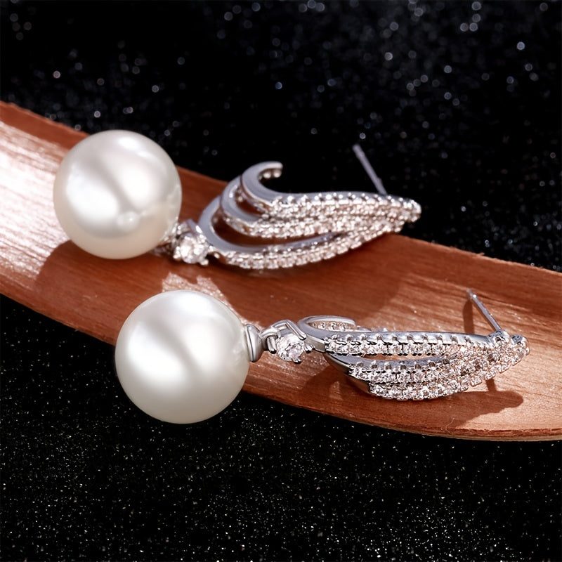 Um par de brincos pendentes para mulher em prata 925 com pérolas de água doce requintadas, acessórios de joalharia hipoalergénicos em estilo boémio, presente para mulher com caixa de oferta exclusiva.