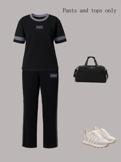 Tendência de moda outono: Conjunto de duas peças para menina composto por t-shirt de manga curta com gola redonda e blocos de cor + calças direitas casuais com cintura elástica e corte largo.